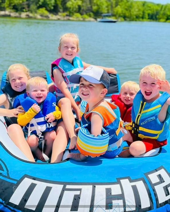 Kids enjoying the water tube at Cape Fair Marina on Table Rock Lake